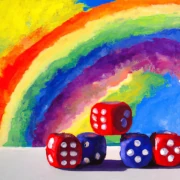 A painting of Yahtzee with a beautiful rainbow